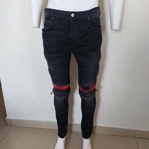 AMIRI black distressed jean.  Men size 34